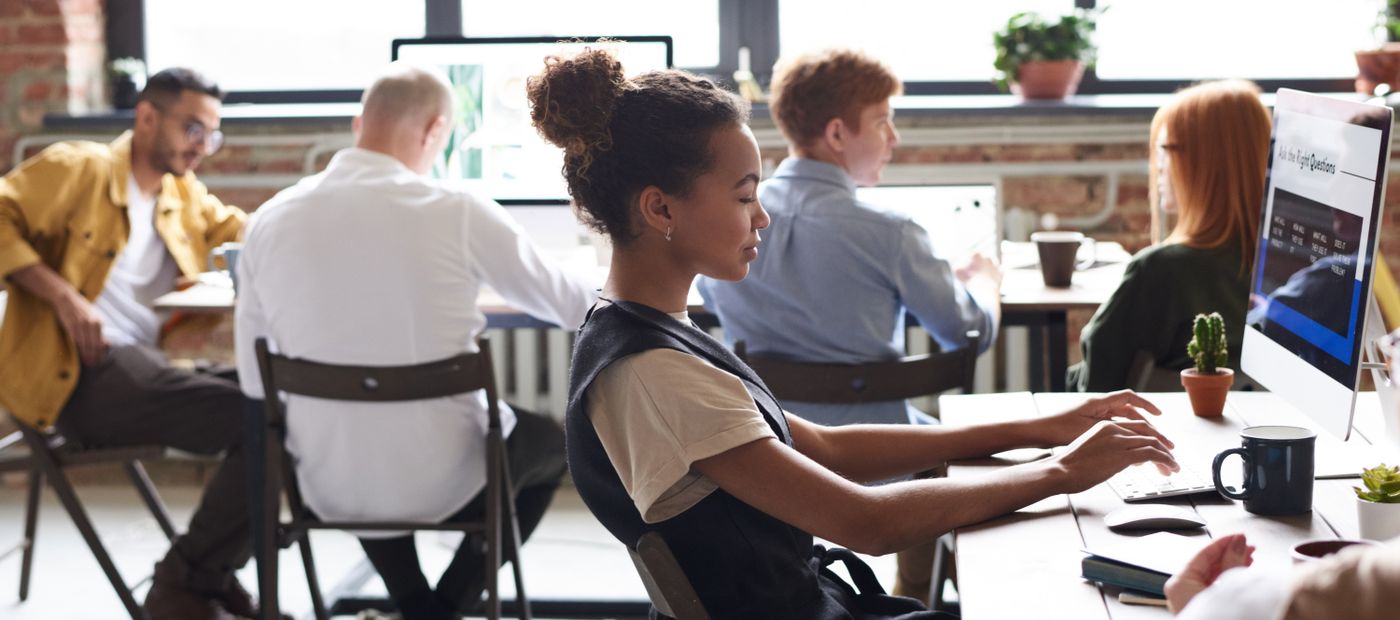 A group of people working together in an office
