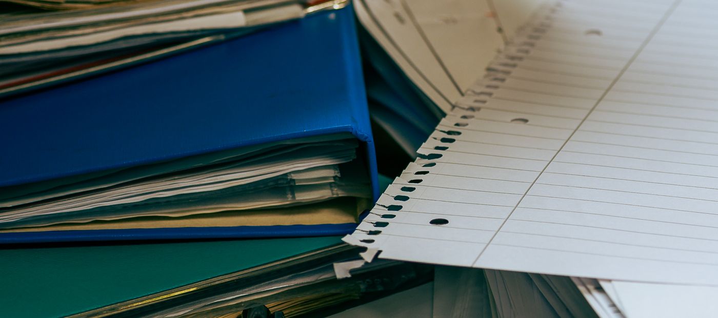 Business documents laid out on a desk
