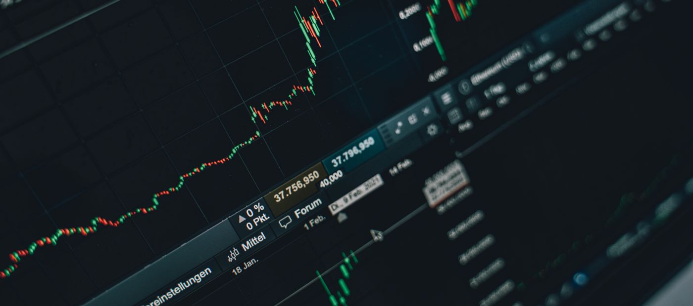 A trading screen showing market charts and financial data